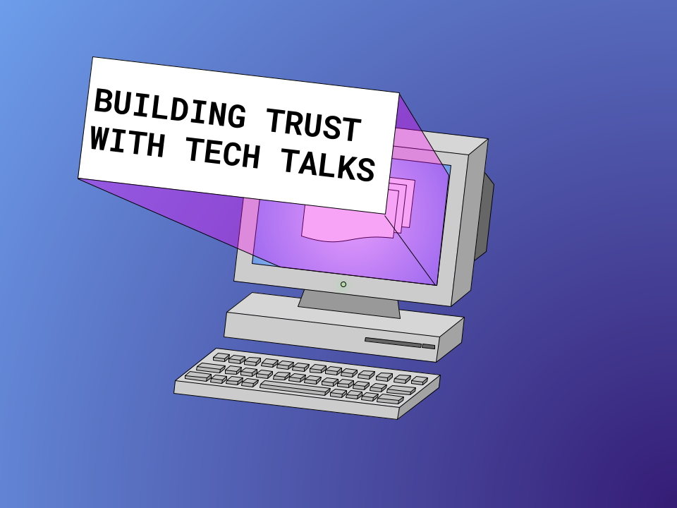 An older model computer whose screen reads &ldquo;Building Trust With Tech Talks&rdquo;